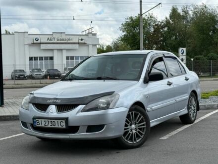 Мицубиси Лансер 2005 в Днепре (Днепропетровске) на Automoto.ua Серый Мицубиси Лансер, объемом двигателя 1.6 л и пробегом 243 тыс. км за 3900 $, фото 1 на Automoto.ua