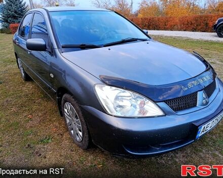 Сірий Міцубісі Lancer, об'ємом двигуна 1.6 л та пробігом 212 тис. км за 3800 $, фото 1 на Automoto.ua