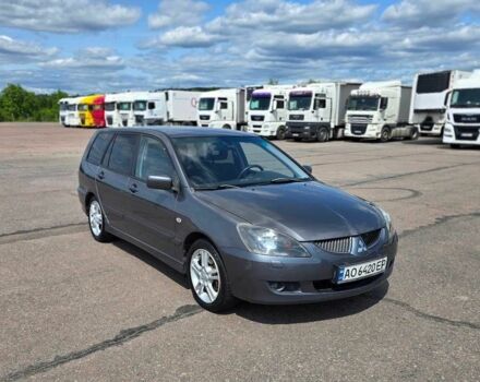 Сірий Міцубісі Lancer, об'ємом двигуна 1.6 л та пробігом 135 тис. км за 4300 $, фото 1 на Automoto.ua