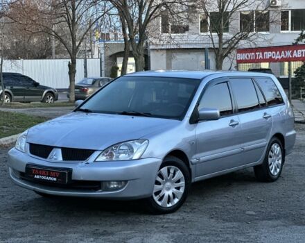 Серый Мицубиси Лансер, объемом двигателя 1.6 л и пробегом 220 тыс. км за 3999 $, фото 1 на Automoto.ua