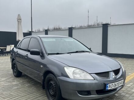 Сірий Міцубісі Lancer, об'ємом двигуна 1.6 л та пробігом 231 тис. км за 3500 $, фото 1 на Automoto.ua
