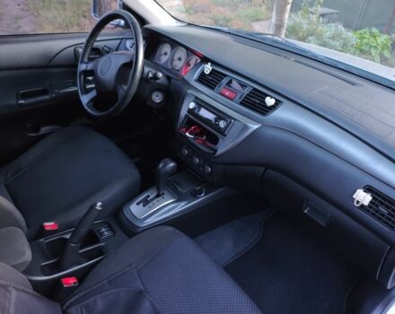 Сірий Міцубісі Lancer, об'ємом двигуна 1.6 л та пробігом 98 тис. км за 4800 $, фото 1 на Automoto.ua