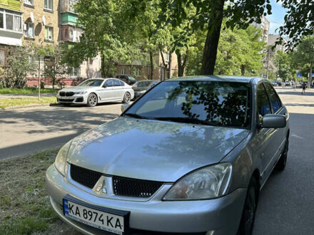 Міцубісі Lancer 2005 у Києві на Automoto.ua Сірий Міцубісі Lancer, об'ємом двигуна 1.58 л та пробігом 290 тис. км за 3600 $, фото 1 на Automoto.ua