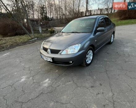 Серый Мицубиси Лансер, объемом двигателя 1.58 л и пробегом 303 тыс. км за 4700 $, фото 1 на Automoto.ua