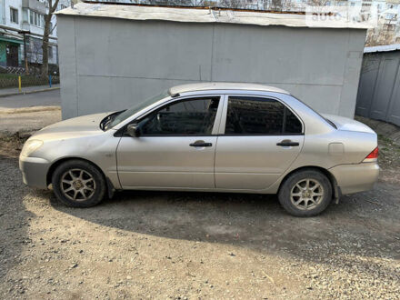 Сірий Міцубісі Lancer, об'ємом двигуна 1.3 л та пробігом 240 тис. км за 3300 $, фото 1 на Automoto.ua