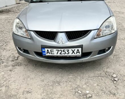 Серый Мицубиси Лансер, объемом двигателя 1.6 л и пробегом 250 тыс. км за 3500 $, фото 1 на Automoto.ua
