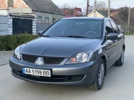 Серый Мицубиси Лансер, объемом двигателя 1.6 л и пробегом 273 тыс. км за 3850 $, фото 1 на Automoto.ua