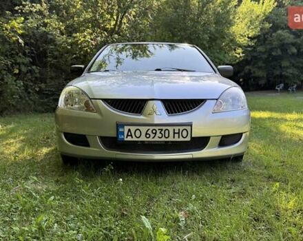Сірий Міцубісі Lancer, об'ємом двигуна 1.58 л та пробігом 300 тис. км за 4500 $, фото 1 на Automoto.ua