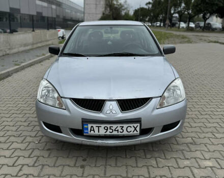 Сірий Міцубісі Lancer, об'ємом двигуна 1.58 л та пробігом 220 тис. км за 3500 $, фото 1 на Automoto.ua