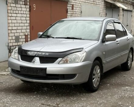Серый Мицубиси Лансер, объемом двигателя 1.6 л и пробегом 171 тыс. км за 3700 $, фото 1 на Automoto.ua