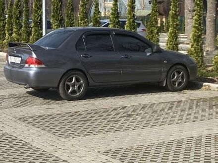 Мицубиси Лансер 2005 в Харькове на Automoto.ua Серый Мицубиси Лансер, объемом двигателя 1.6 л и пробегом 280 тыс. км за 4200 $, фото 1 на Automoto.ua