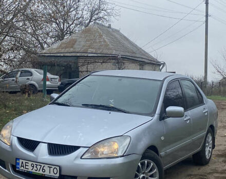 Сірий Міцубісі Lancer, об'ємом двигуна 1.58 л та пробігом 210 тис. км за 3900 $, фото 1 на Automoto.ua