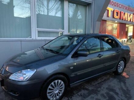 Сірий Міцубісі Lancer, об'ємом двигуна 1.6 л та пробігом 2 тис. км за 4140 $, фото 1 на Automoto.ua