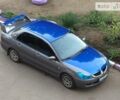 Сірий Міцубісі Lancer, об'ємом двигуна 1.6 л та пробігом 188 тис. км за 7000 $, фото 1 на Automoto.ua