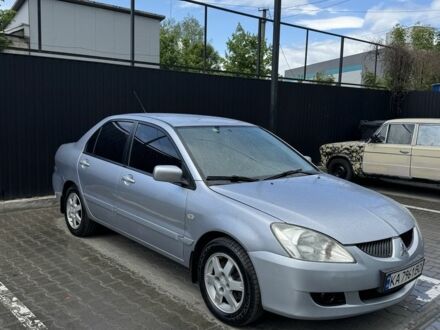 Міцубісі Lancer 2005 у Києві на Automoto.ua Сірий Міцубісі Lancer, об'ємом двигуна 1.6 л та пробігом 300 тис. км за 3600 $, фото 1 на Automoto.ua
