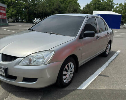 Сірий Міцубісі Lancer, об'ємом двигуна 1.3 л та пробігом 300 тис. км за 4100 $, фото 1 на Automoto.ua