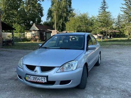 Сірий Міцубісі Lancer, об'ємом двигуна 1.6 л та пробігом 154 тис. км за 4700 $, фото 1 на Automoto.ua