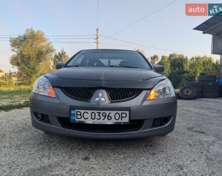 Сірий Міцубісі Lancer, об'ємом двигуна 1.58 л та пробігом 384 тис. км за 2500 $, фото 1 на Automoto.ua