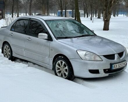 Сірий Міцубісі Lancer, об'ємом двигуна 1.6 л та пробігом 256 тис. км за 3800 $, фото 1 на Automoto.ua