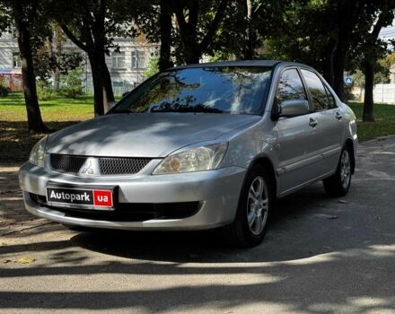 Серый Мицубиси Лансер, объемом двигателя 1.6 л и пробегом 196 тыс. км за 4040 $, фото 1 на Automoto.ua