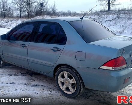 Серый Мицубиси Лансер, объемом двигателя 1.6 л и пробегом 139 тыс. км за 5000 $, фото 1 на Automoto.ua