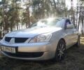 Сірий Міцубісі Lancer, об'ємом двигуна 1.6 л та пробігом 245 тис. км за 5300 $, фото 1 на Automoto.ua