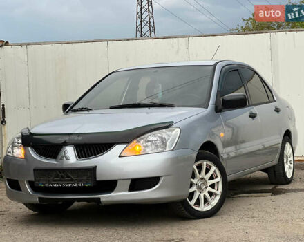 Сірий Міцубісі Lancer, об'ємом двигуна 1.6 л та пробігом 310 тис. км за 3350 $, фото 1 на Automoto.ua