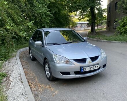 Серый Мицубиси Лансер, объемом двигателя 1.6 л и пробегом 300 тыс. км за 3950 $, фото 1 на Automoto.ua