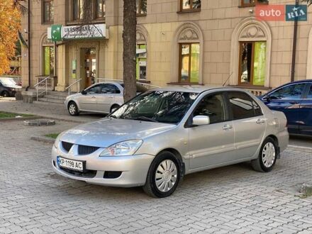 Мицубиси Лансер 2005 в Запорожье на Automoto.ua Серый Мицубиси Лансер, объемом двигателя 1.58 л и пробегом 200 тыс. км за 3850 $, фото 1 на Automoto.ua