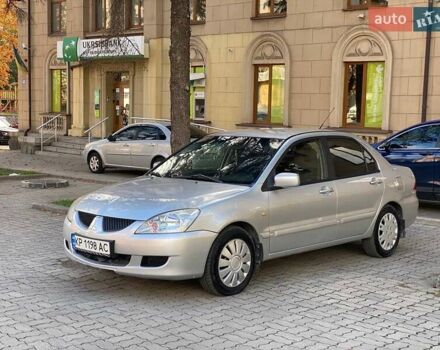 Сірий Міцубісі Lancer, об'ємом двигуна 1.58 л та пробігом 250 тис. км за 3750 $, фото 1 на Automoto.ua
