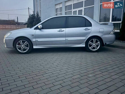 Серый Мицубиси Лансер, объемом двигателя 2 л и пробегом 188 тыс. км за 4200 $, фото 1 на Automoto.ua