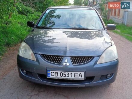 Мицубиси Лансер 2005 в Нежине на Automoto.ua Серый Мицубиси Лансер, объемом двигателя 1.6 л и пробегом 193 тыс. км за 3000 $, фото 1 на Automoto.ua