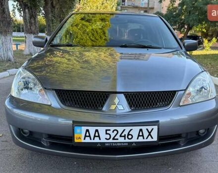 Сірий Міцубісі Lancer, об'ємом двигуна 1.58 л та пробігом 290 тис. км за 4450 $, фото 1 на Automoto.ua