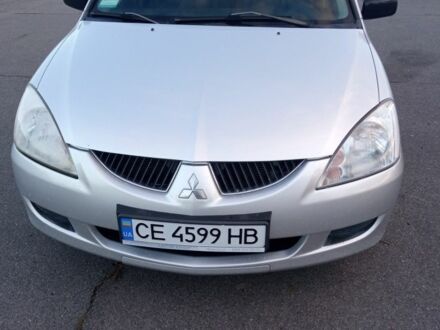 Сірий Міцубісі Lancer, об'ємом двигуна 1.6 л та пробігом 214 тис. км за 3637 $, фото 1 на Automoto.ua