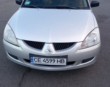 Сірий Міцубісі Lancer, об'ємом двигуна 1.6 л та пробігом 214 тис. км за 3637 $, фото 1 на Automoto.ua