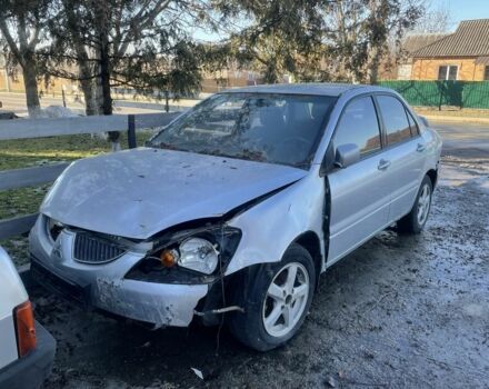 Серый Мицубиси Лансер, объемом двигателя 1.6 л и пробегом 158 тыс. км за 1200 $, фото 1 на Automoto.ua