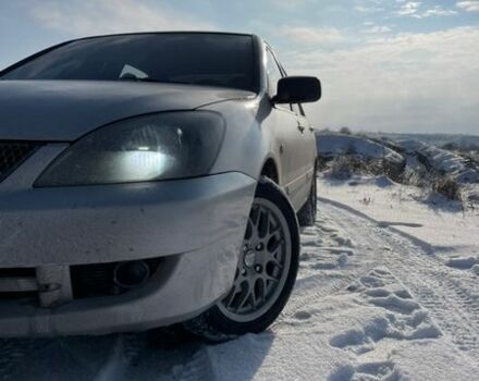 Серый Мицубиси Лансер, объемом двигателя 1.58 л и пробегом 250 тыс. км за 2900 $, фото 1 на Automoto.ua