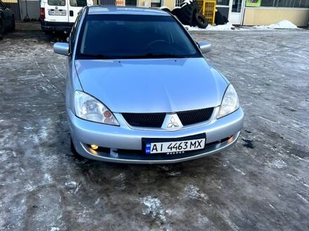 Сірий Міцубісі Lancer, об'ємом двигуна 1.6 л та пробігом 300 тис. км за 4200 $, фото 1 на Automoto.ua