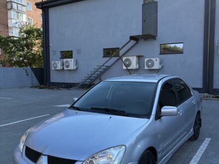 Сірий Міцубісі Lancer, об'ємом двигуна 1.6 л та пробігом 280 тис. км за 4550 $, фото 1 на Automoto.ua