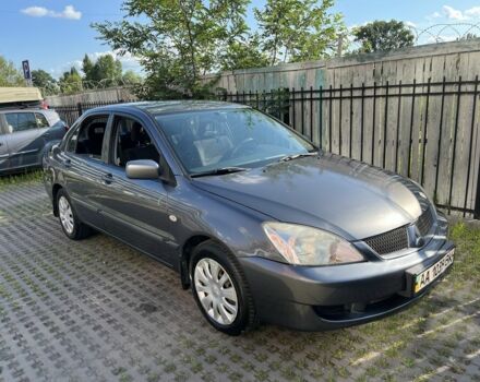 Сірий Міцубісі Lancer, об'ємом двигуна 1.6 л та пробігом 268 тис. км за 3000 $, фото 1 на Automoto.ua