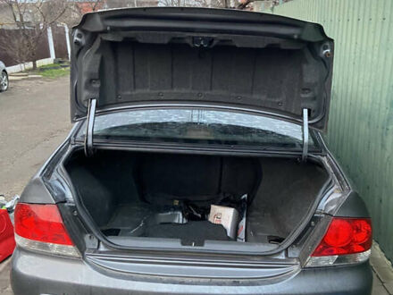 Сірий Міцубісі Lancer, об'ємом двигуна 1.58 л та пробігом 230 тис. км за 1400 $, фото 1 на Automoto.ua