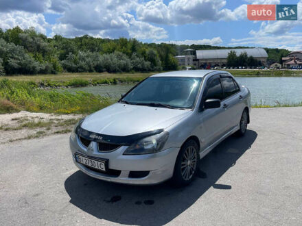 Мицубиси Лансер 2005 в Днепре (Днепропетровске) на Automoto.ua Серый Мицубиси Лансер, объемом двигателя 1.6 л и пробегом 257 тыс. км за 3500 $, фото 1 на Automoto.ua