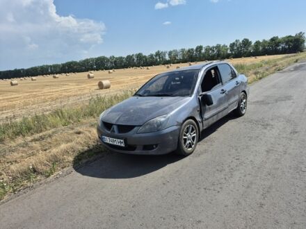 Мицубиси Лансер 2005 в Зенькове на Automoto.ua Серый Мицубиси Лансер, объемом двигателя 1.6 л и пробегом 245 тыс. км за 1500 $, фото 1 на Automoto.ua