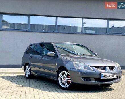 Сірий Міцубісі Lancer, об'ємом двигуна 1.58 л та пробігом 138 тис. км за 4000 $, фото 1 на Automoto.ua