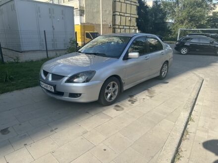 Мицубиси Лансер 2005 в Днепре (Днепропетровске) на Automoto.ua Серый Мицубиси Лансер, объемом двигателя 2 л и пробегом 777 тыс. км за 3500 $, фото 1 на Automoto.ua
