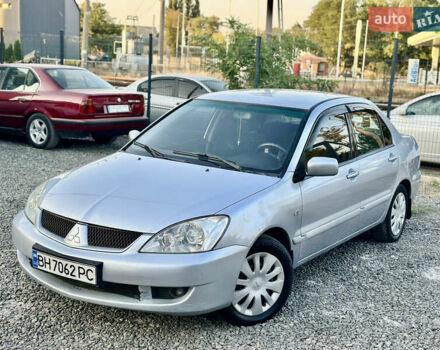 Сірий Міцубісі Lancer, об'ємом двигуна 1.58 л та пробігом 252 тис. км за 3999 $, фото 1 на Automoto.ua