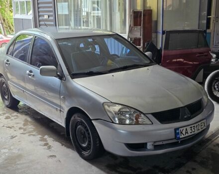 Сірий Міцубісі Lancer, об'ємом двигуна 1.6 л та пробігом 220 тис. км за 1900 $, фото 1 на Automoto.ua
