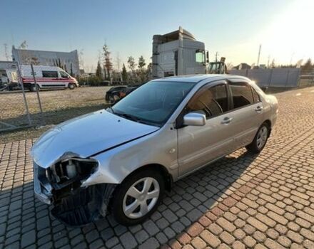 Серый Мицубиси Лансер, объемом двигателя 1.58 л и пробегом 303 тыс. км за 2500 $, фото 1 на Automoto.ua