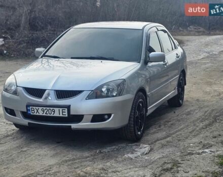 Серый Мицубиси Лансер, объемом двигателя 2 л и пробегом 240 тыс. км за 3950 $, фото 1 на Automoto.ua