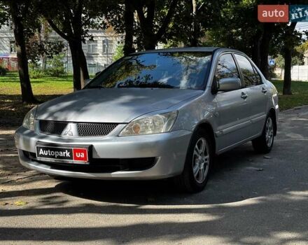 Сірий Міцубісі Lancer, об'ємом двигуна 1.6 л та пробігом 196 тис. км за 4490 $, фото 1 на Automoto.ua